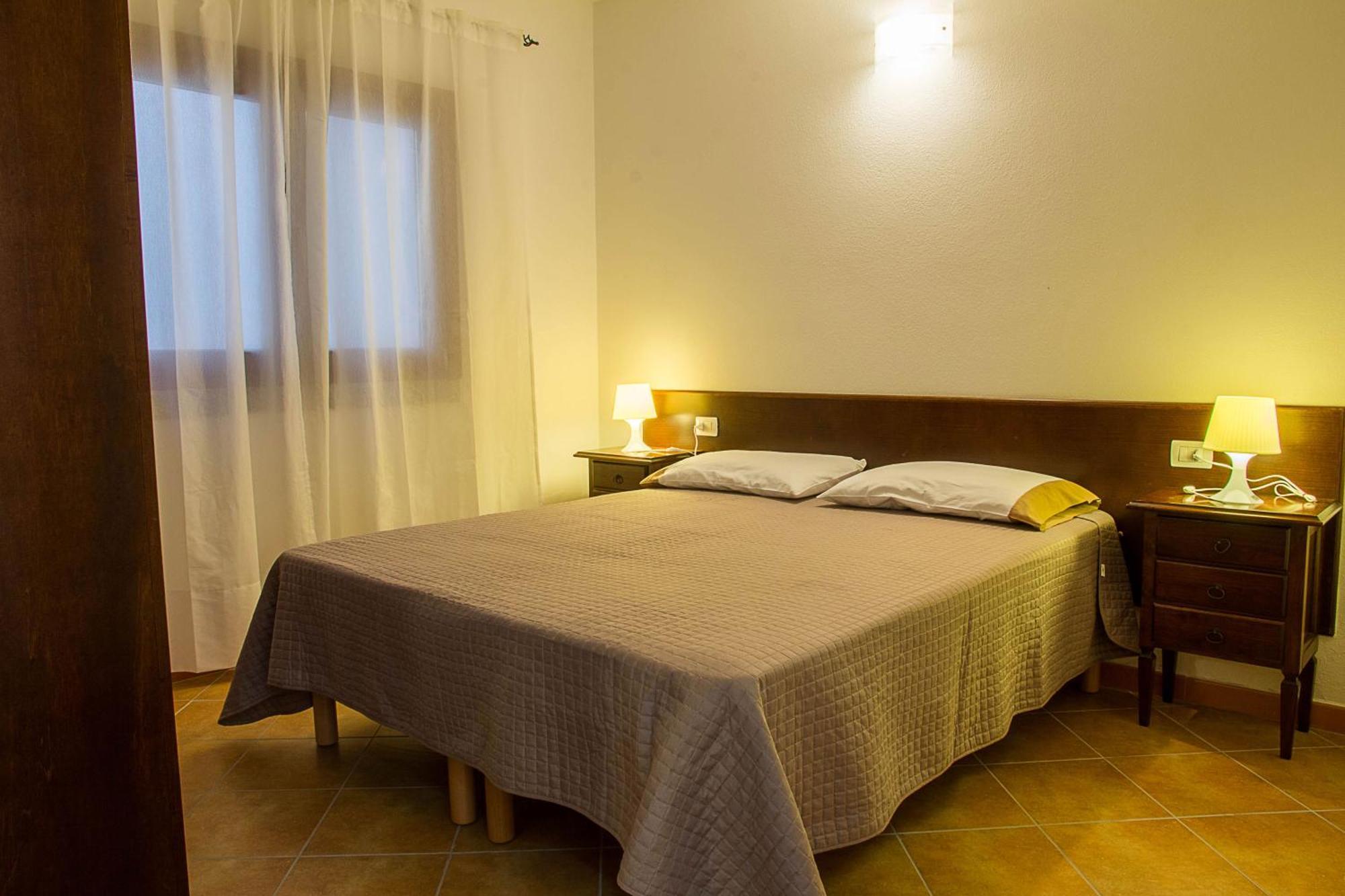 Gf Apartments Li Seddi Badesi Bagian luar foto
