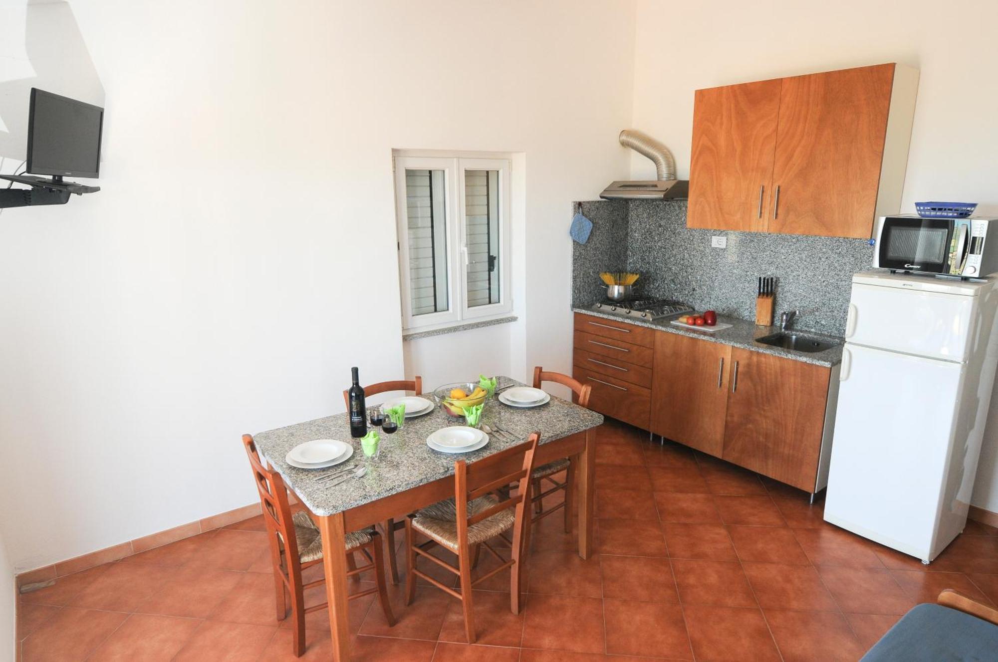 Gf Apartments Li Seddi Badesi Bagian luar foto
