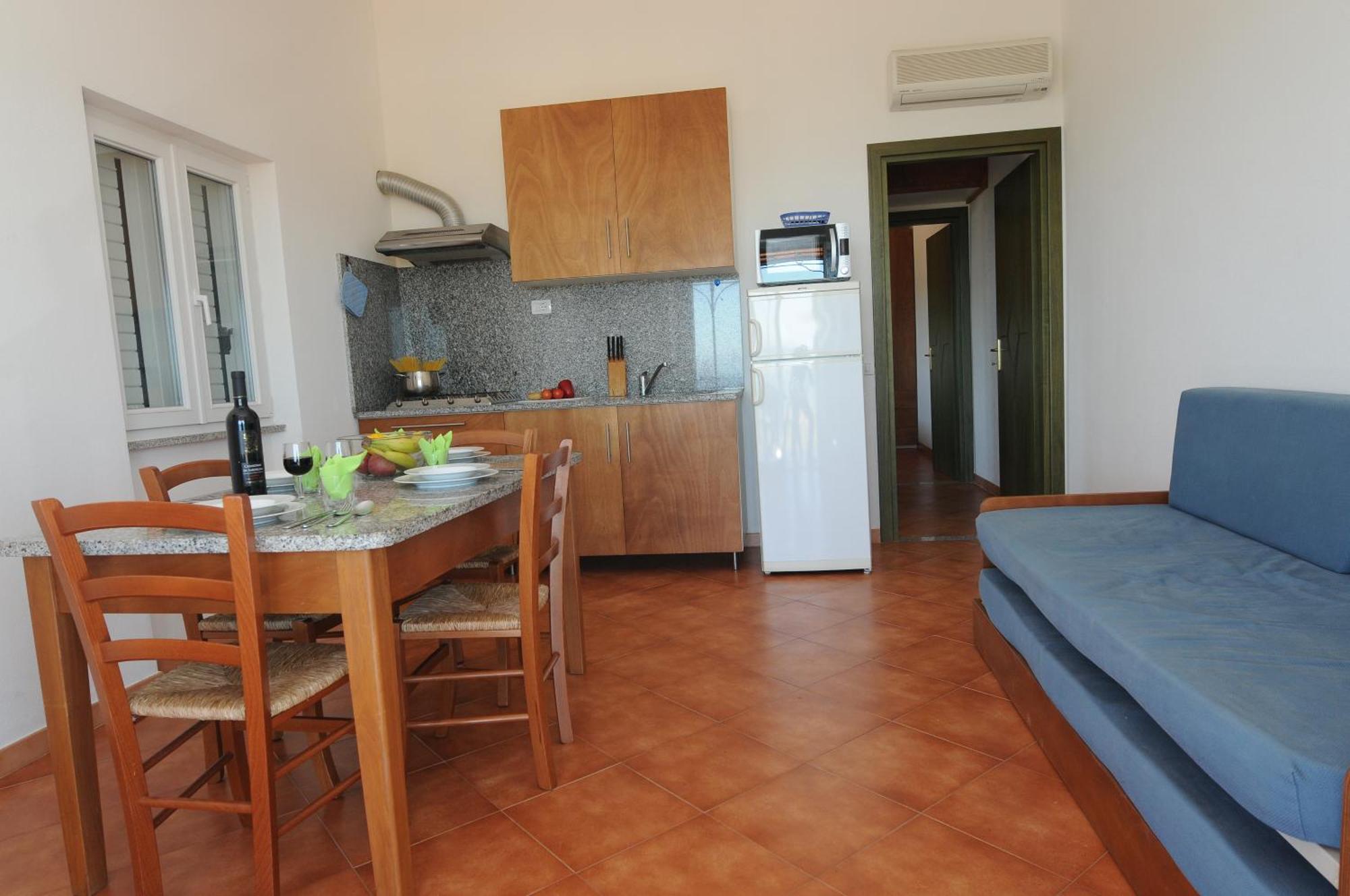 Gf Apartments Li Seddi Badesi Bagian luar foto